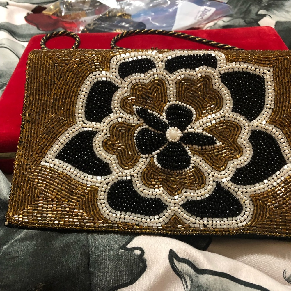 Over the shoulder strap clutch purse